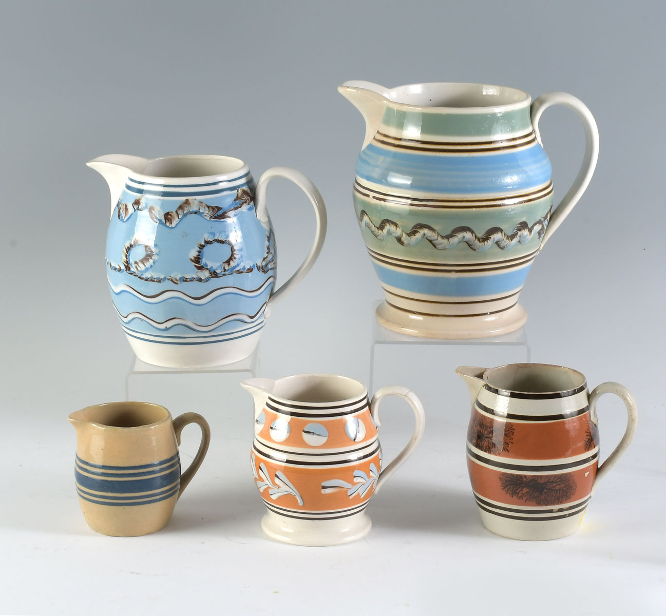 5 PC. MOCHAWARE PITCHERS: Largest