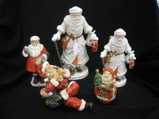 5 Santa Figurines including