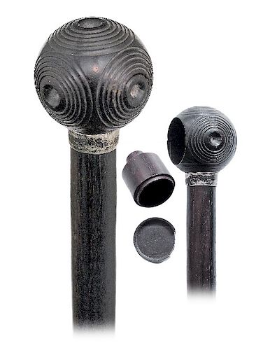 59. EBONY PUZZLE CONTAINER CANE