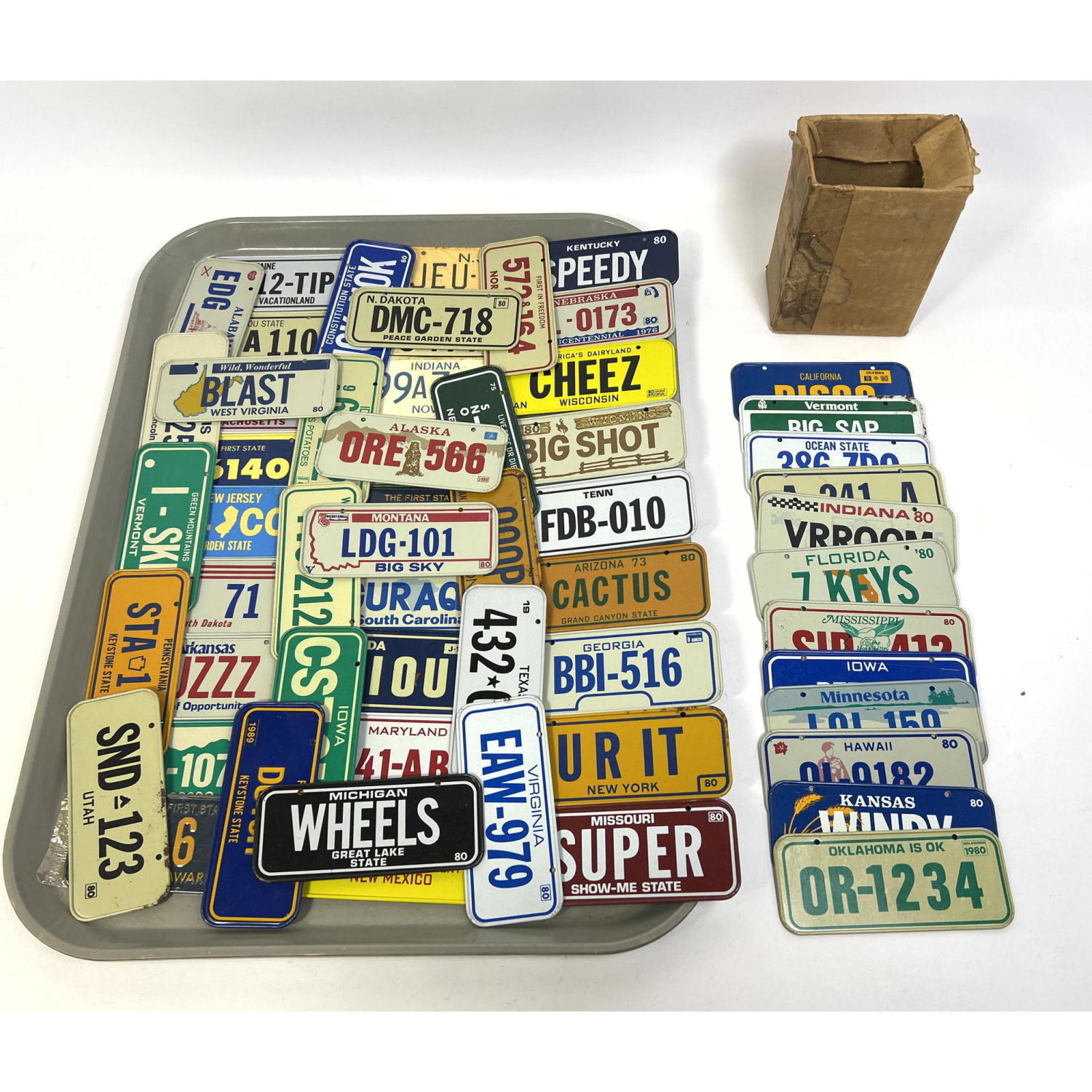 59pc Lot Small License Plates. Many