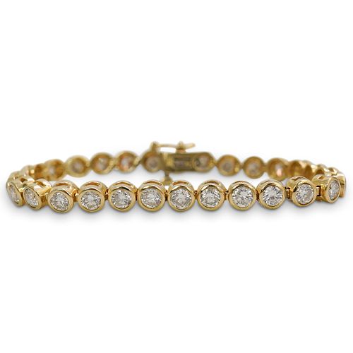5CT DIAMOND AND 14K GOLD TENNIS