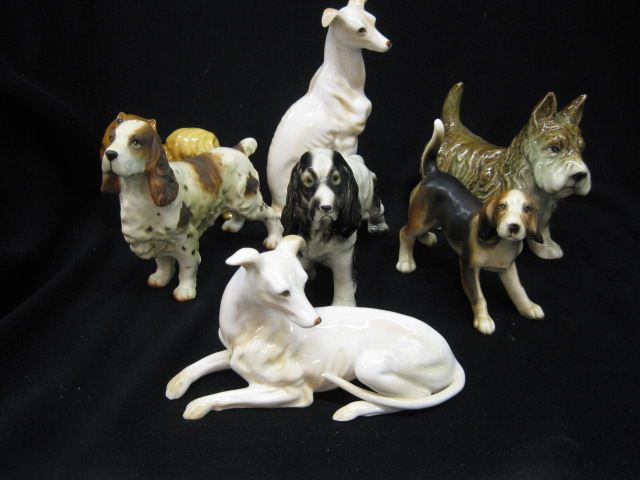 6 Dog Figurines an assortment of