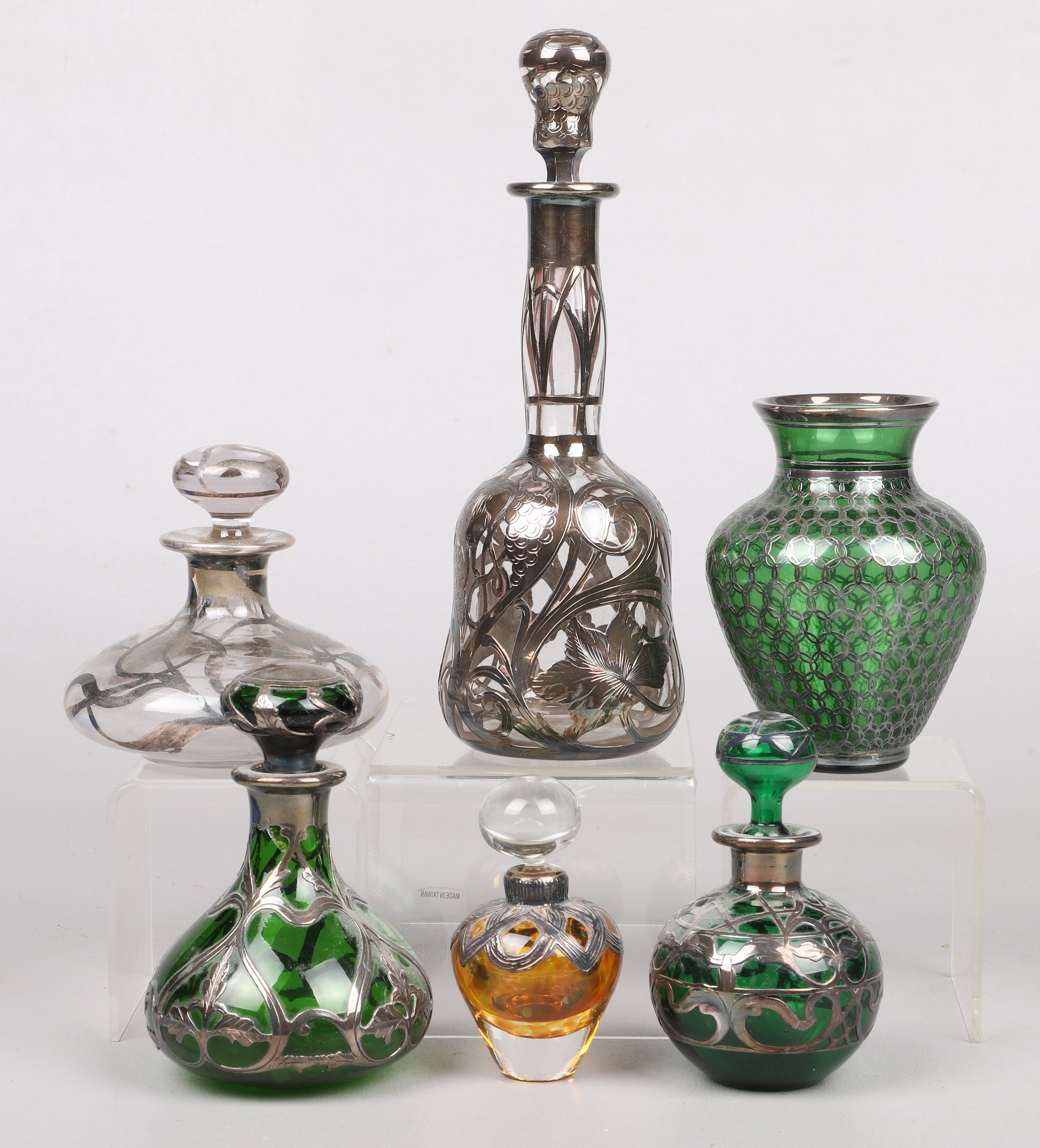 (6) Sterling clad bottles and
