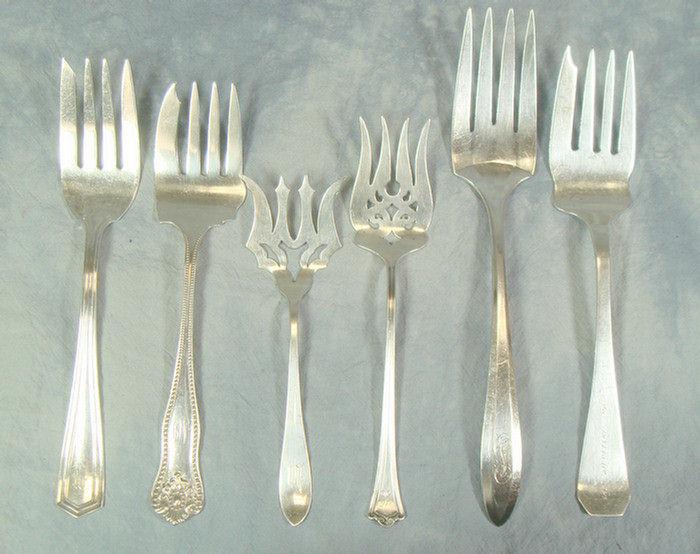 6 sterling silver serving forks,