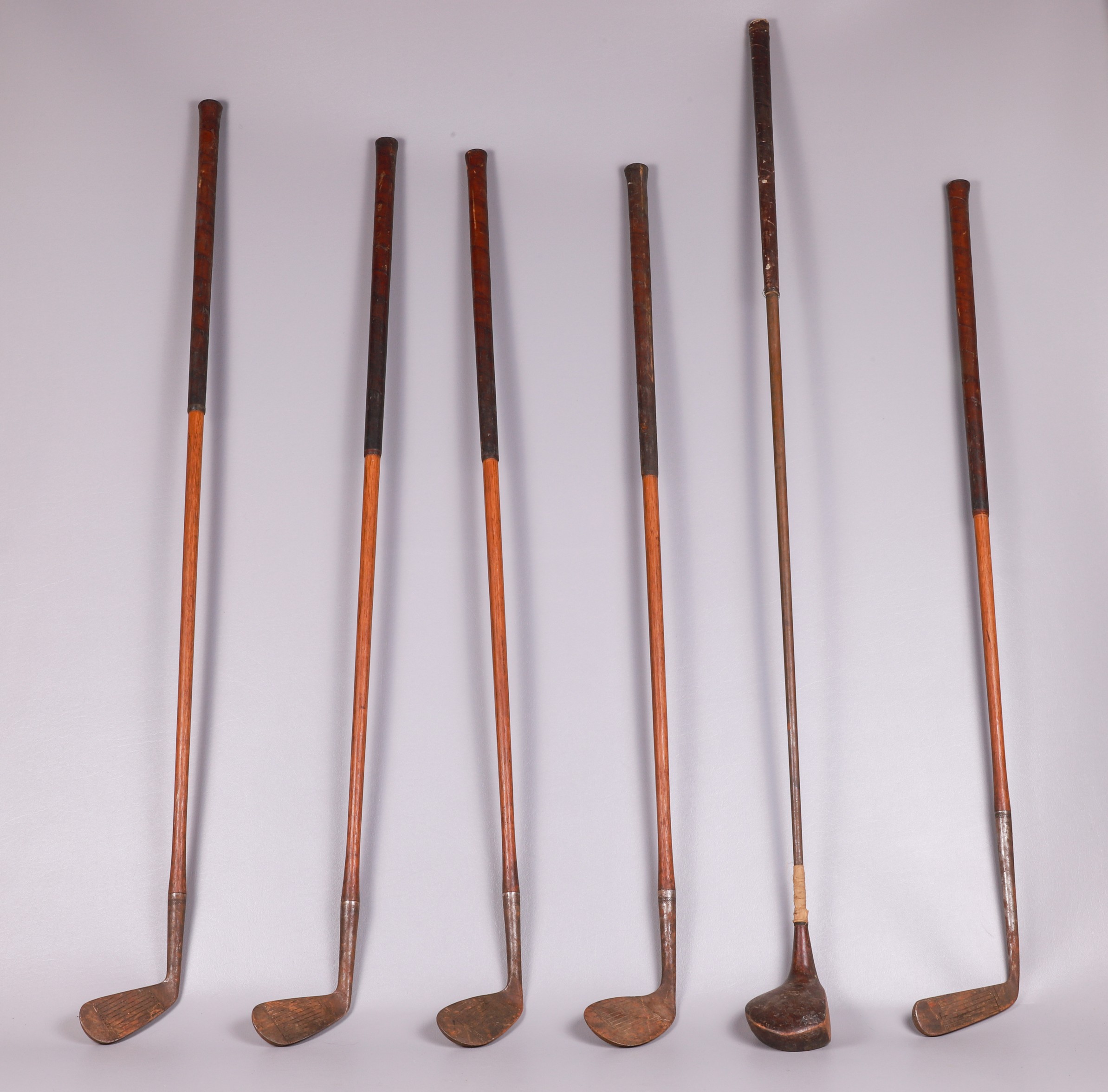 (6) Vintage golf clubs, wood shaft,