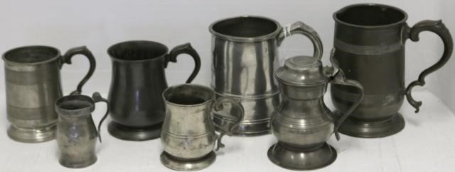 7 ANTIQUE PEWTER HANDLED MUGS,
