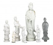 (7) Asian figurines, c/o unmar
