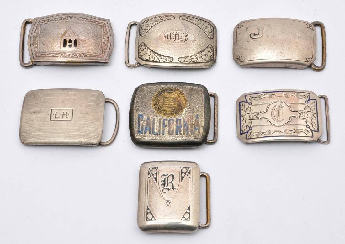 7 BELT BUCKLES. 4 MARKED