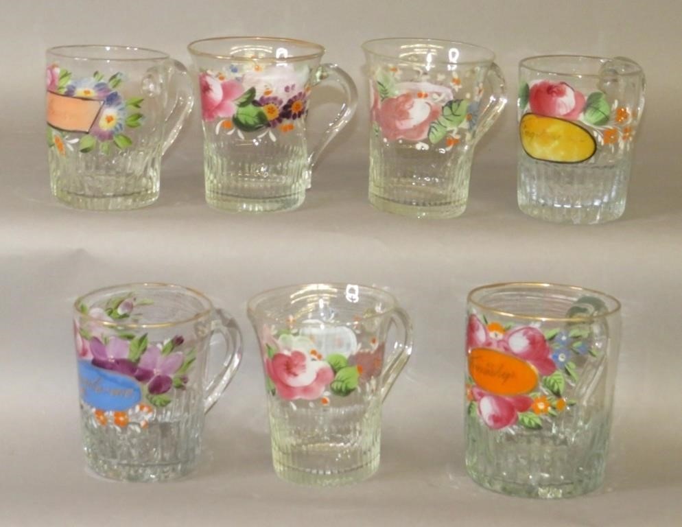 7 BLOWN UNCOLORED GLASS MUGS,