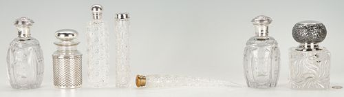 7 CUT GLASS BOTTLES W/ SILVER LIDS,
