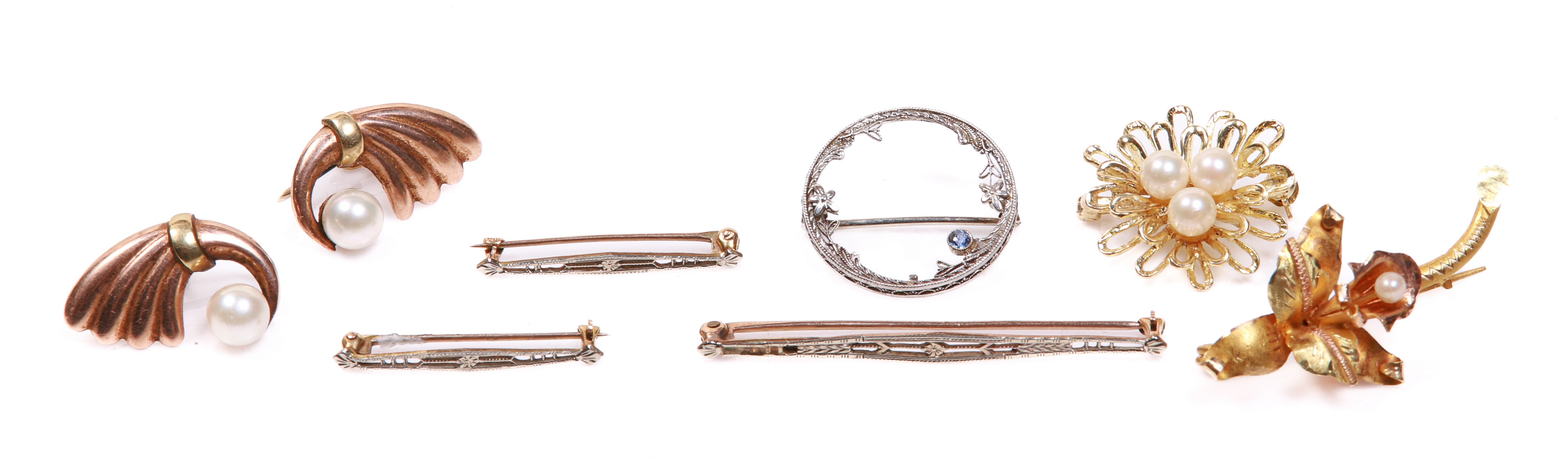 (7) Gold pins and earrings to