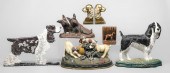 (7) Metal dog items, c/o cast