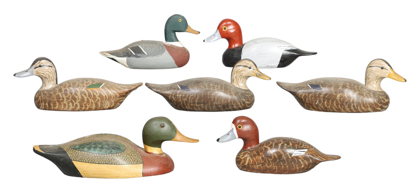 (7) Miniature duck decoys to