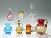 7 PIECE ART GLASS PITCHERS AND