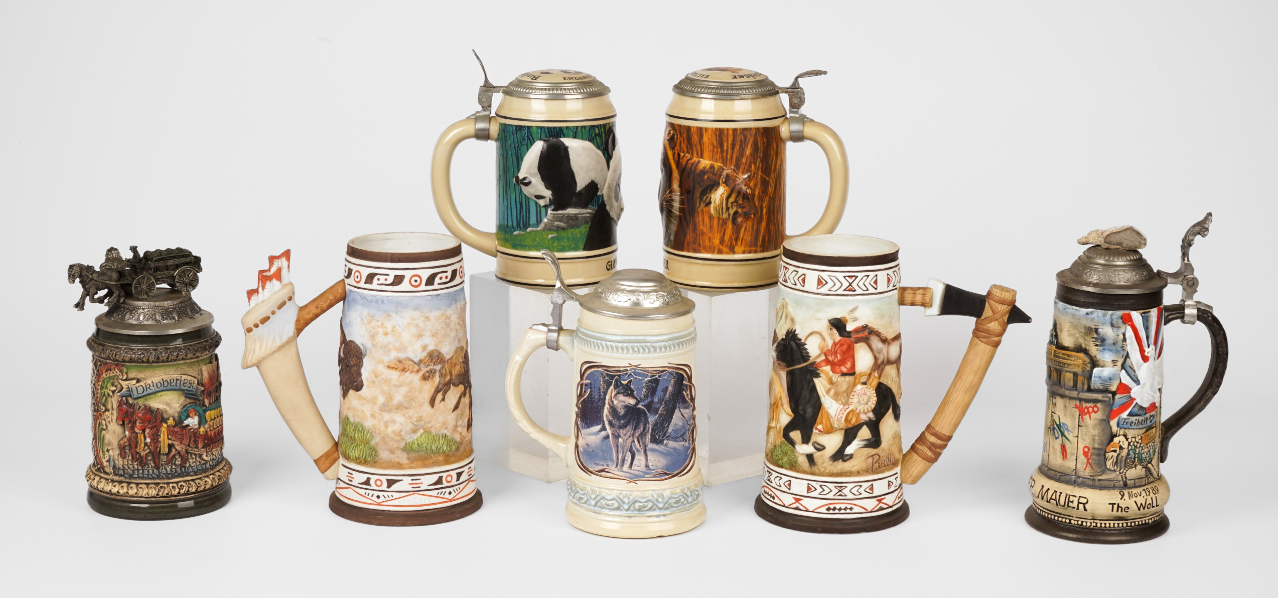 (7) Pottery collector steins, c/o
