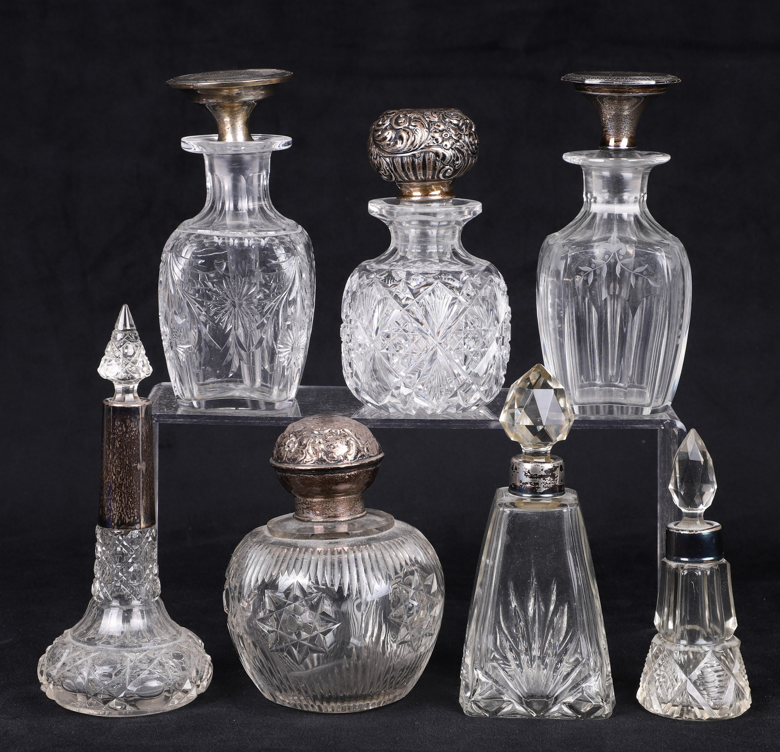 (7) Sterling stoppered bottles to
