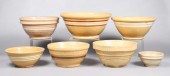 (7) Stoneware mixing bowls to