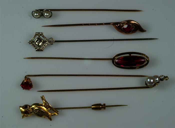 (7) unmarked YG stick pins all with