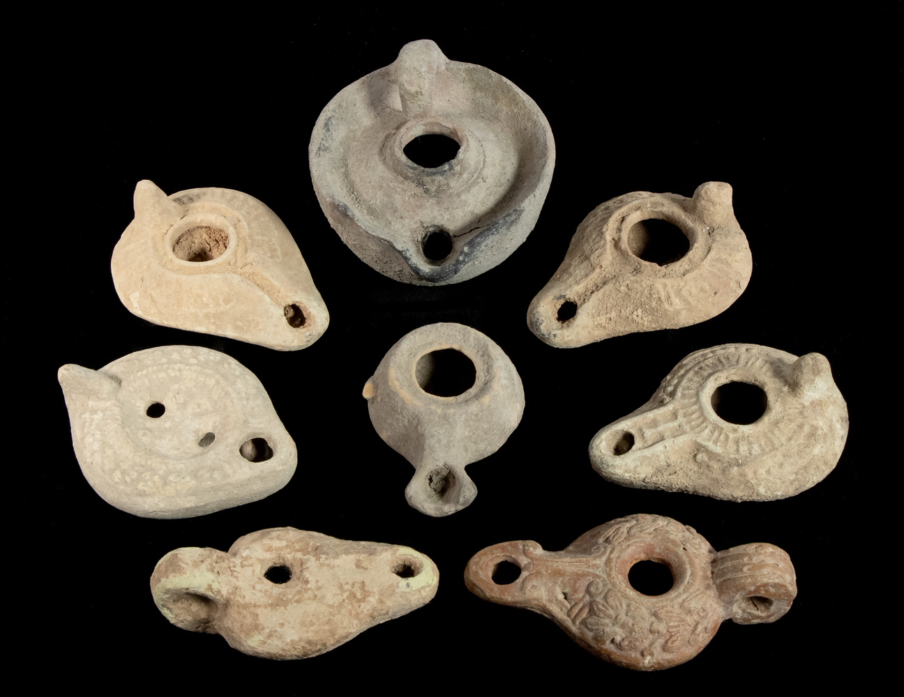 (8) ANCIENT ROMAN POTTERY LAMPS 100