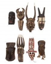8 CARVED AFRICAN MASKS: Dogon