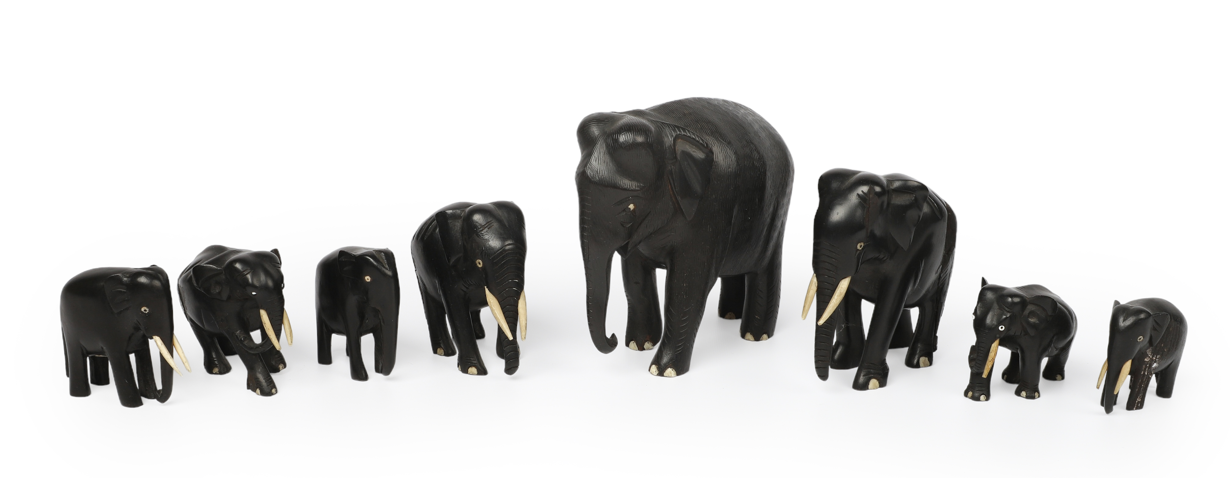 (8) Ebony elephant figurines,