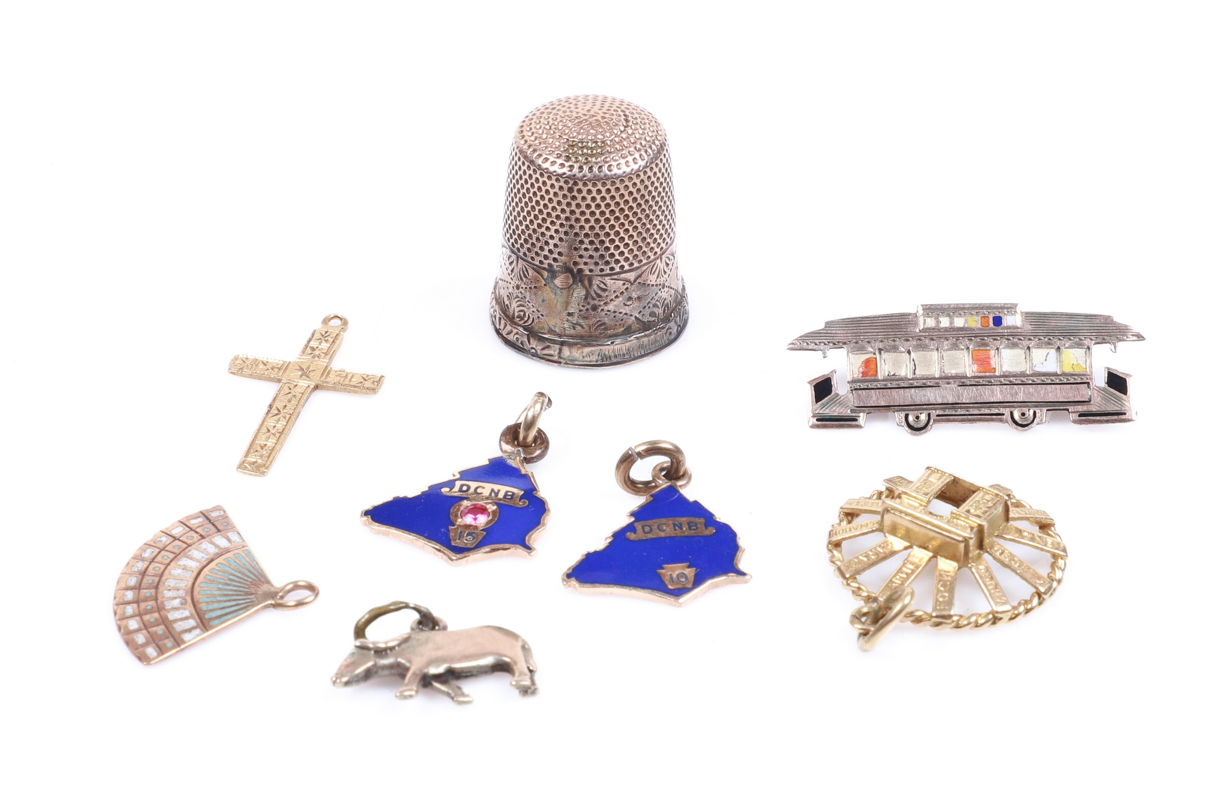 (8) Gold charms and thimble to