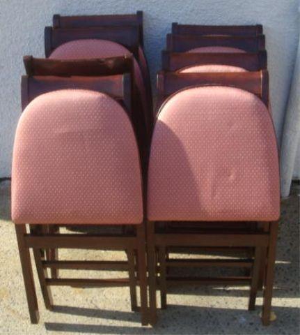 8 Mahogany Folding Chairs. From a