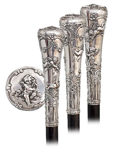 8. SILVER PUTTI DRESS CANE -CA.