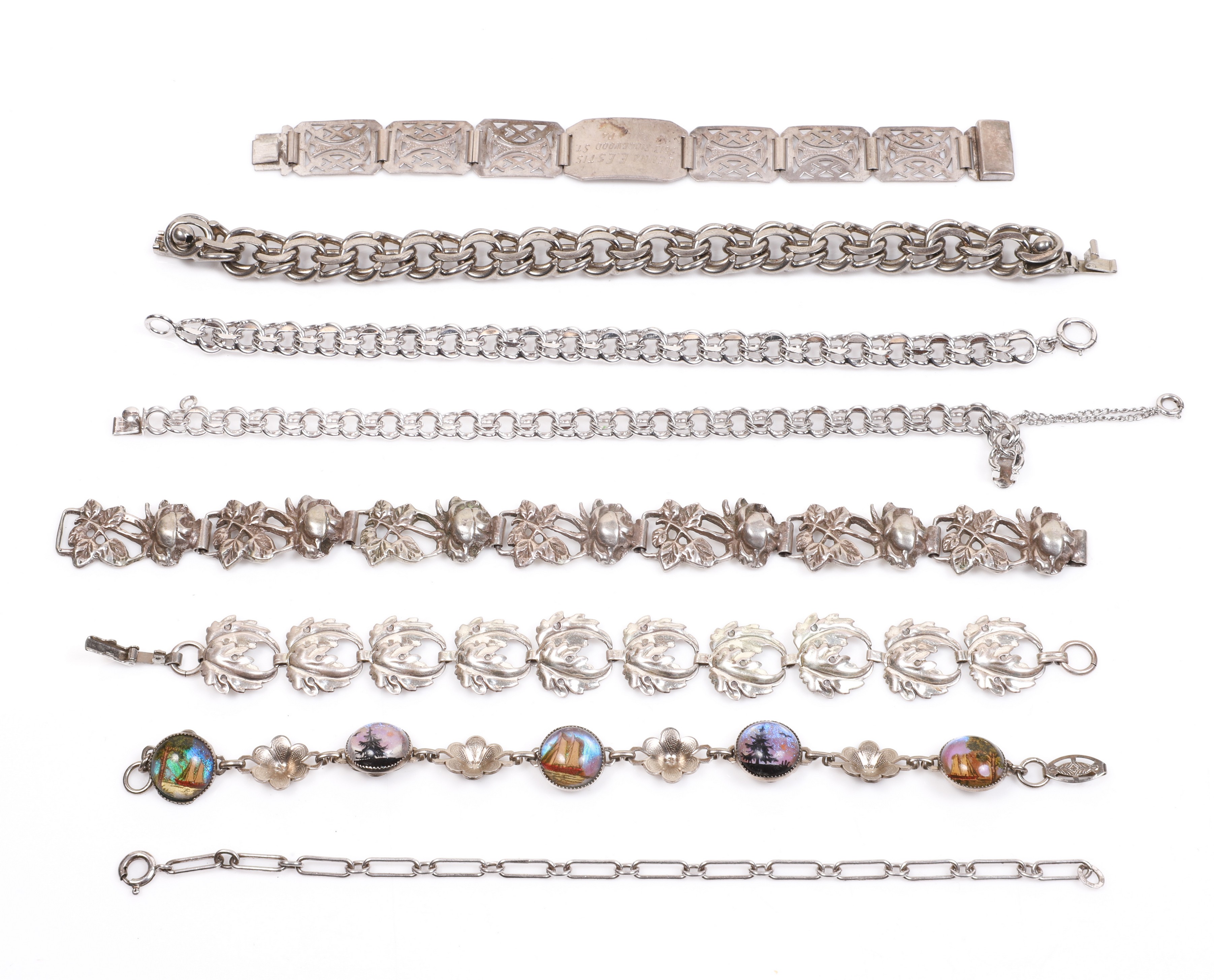 (8) Sterling and silver bracelets