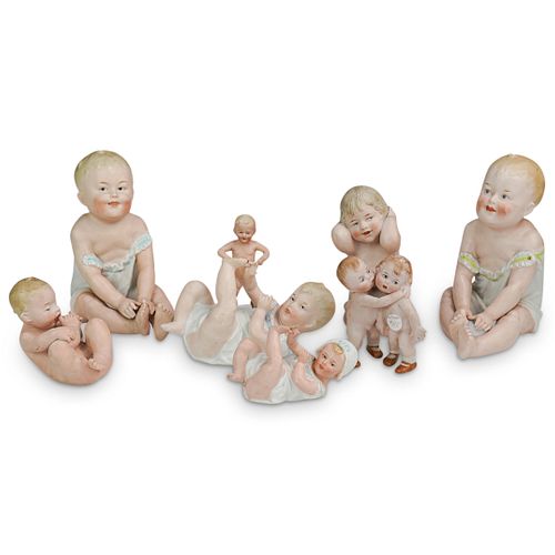 (8PC) PORCELAIN BABY FIGURINE