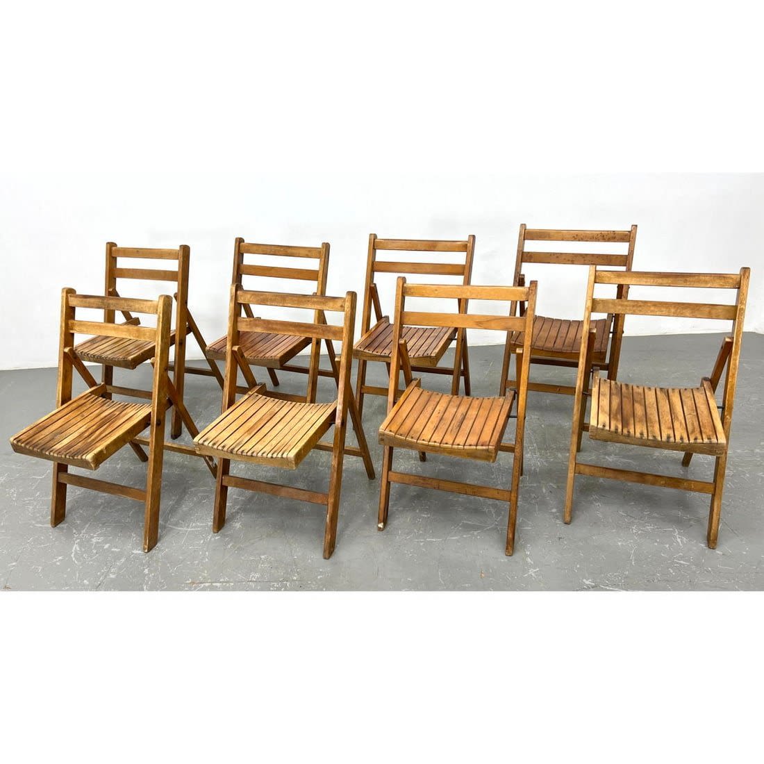8pcs Slat Seat Folding Chairs.
