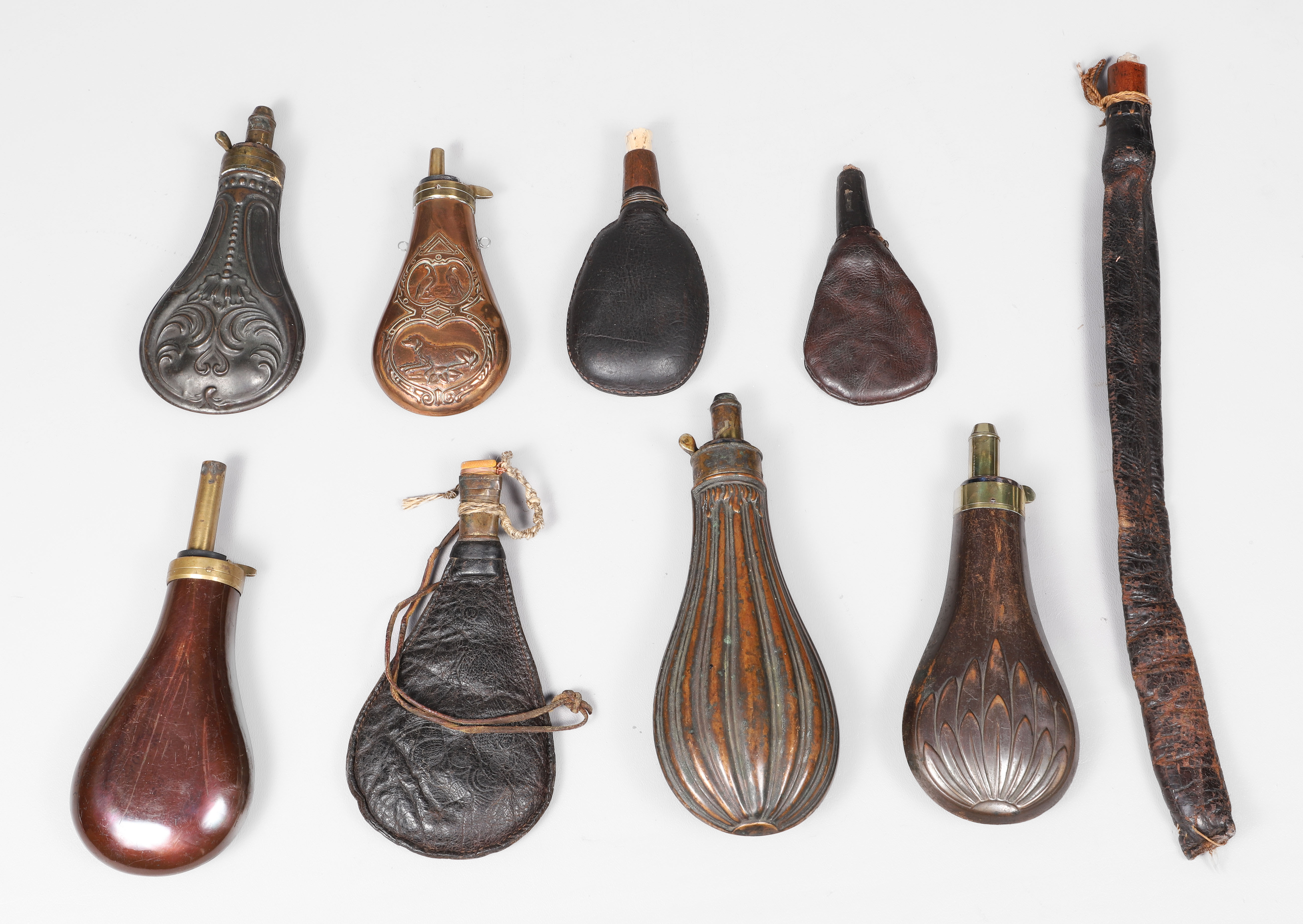 (9) Brass & copper shot flasks &