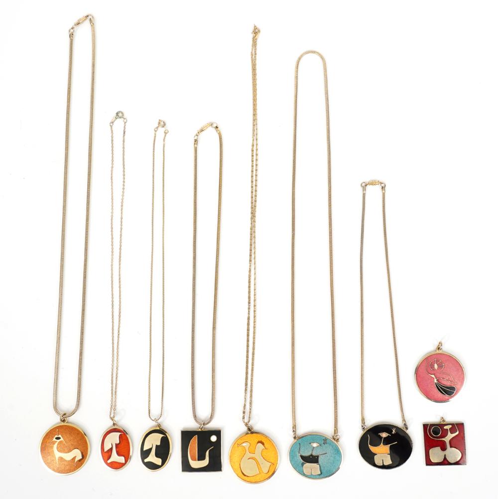 9 ENAMELED PENDANTS BY ROBERT