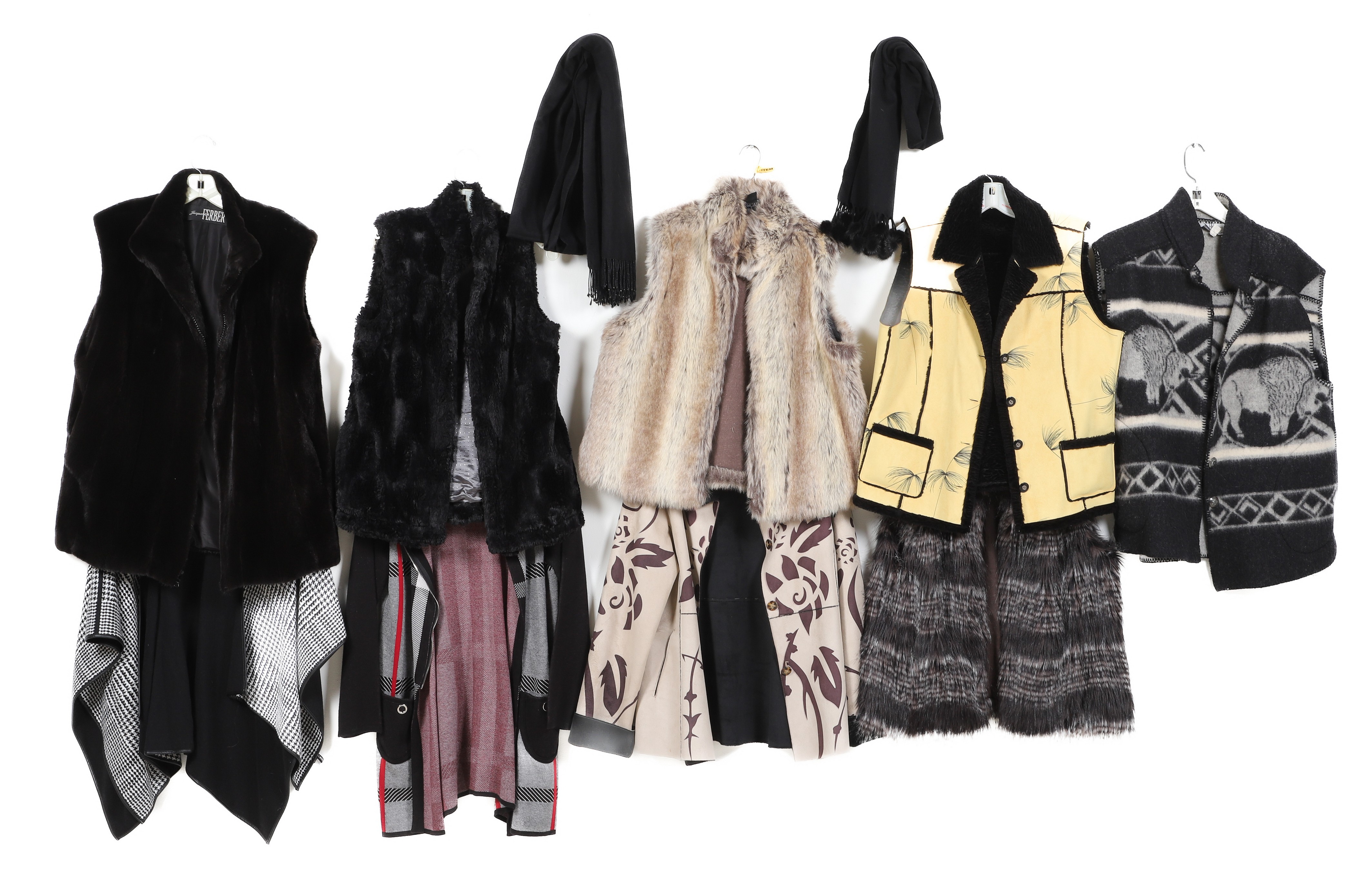 (9) Ladies sweaters, vests, fur,