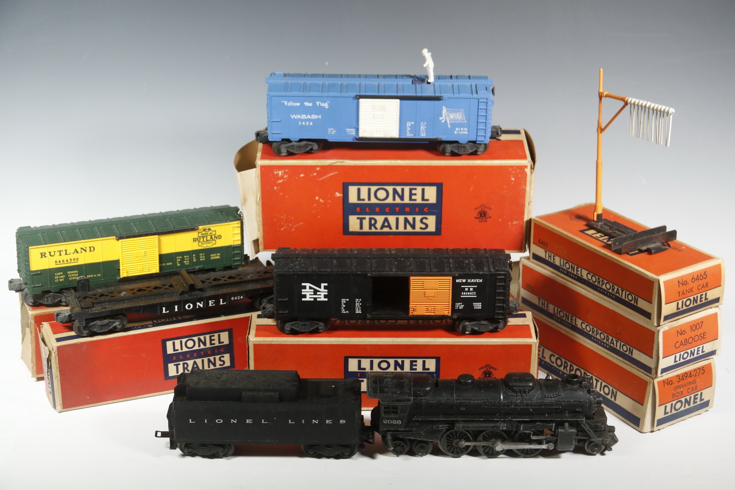 (9) LIONEL TRAIN CARS IN BOXES
