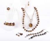 (9) Pc sterling and tigers eye