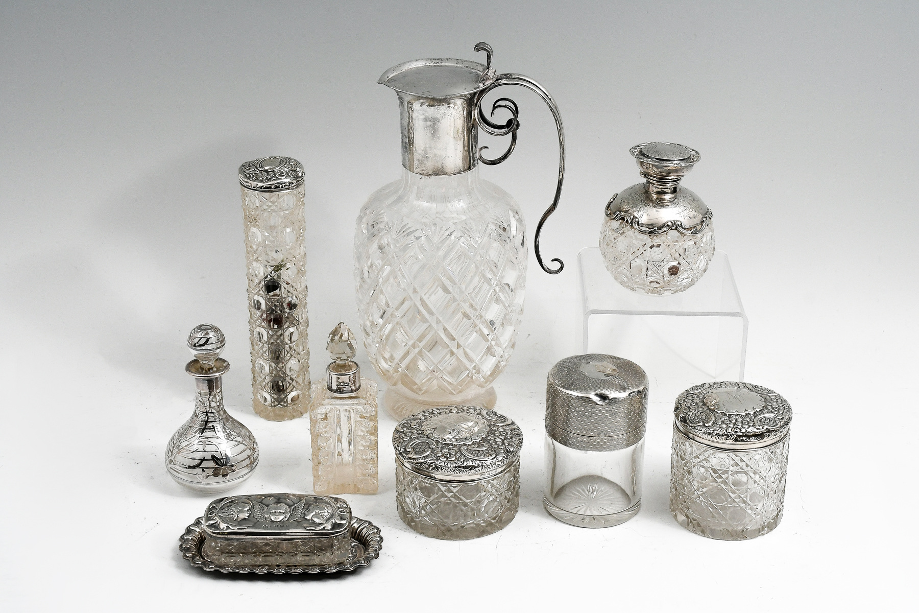 9 PC. STERLING LIDDED BOTTLES,