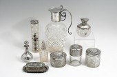 9 PC. STERLING LIDDED BOTTLES,