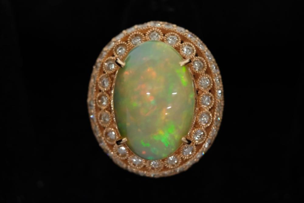 9.73 CT HARLEQUIN FIRE OPAL RING SZ