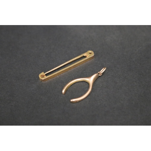 9ct gold pin and a chicken wish