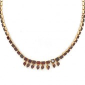 9K YELLOW GOLD & GARNET VICTOR