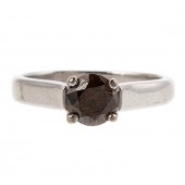 A 0.75 CARAT SCOTT KAY COGNAC