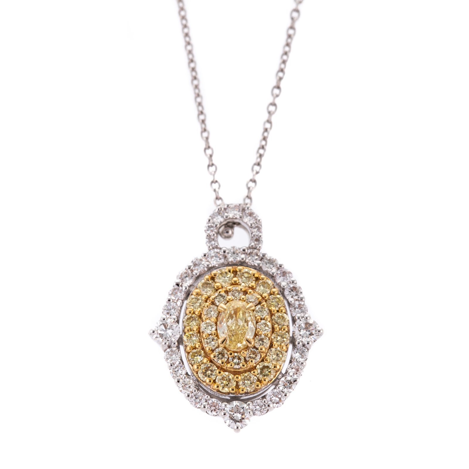 A 1.02 CTW OVAL YELLOW DIAMOND