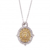 A 1.02 CTW OVAL YELLOW DIAMOND