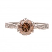 A 1.09 CT COGNAC DIAMOND IN TA