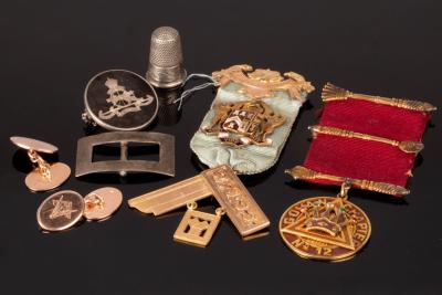 A 10k gold and paste set Masonic