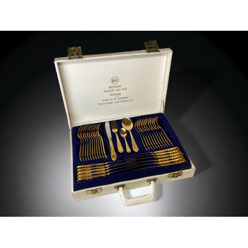 A 12 PLACE SETTING BESTECKE