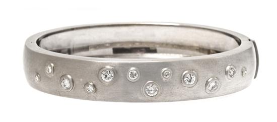 * A 14 Karat White Gold and Diamond
