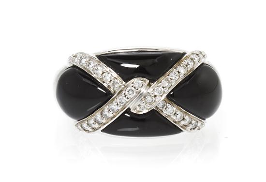 * A 14 Karat White Gold Onyx and