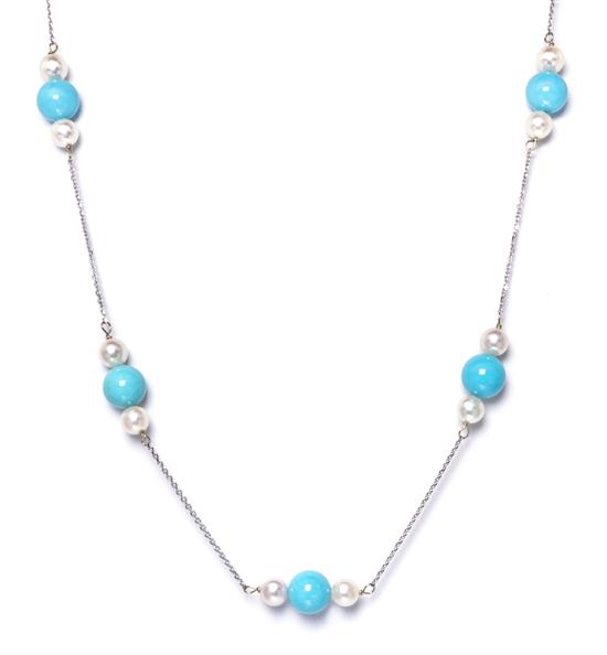 A 14 Karat White Gold Cultured